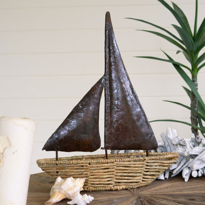 Seagrass Boat With Rustic Metal Sail