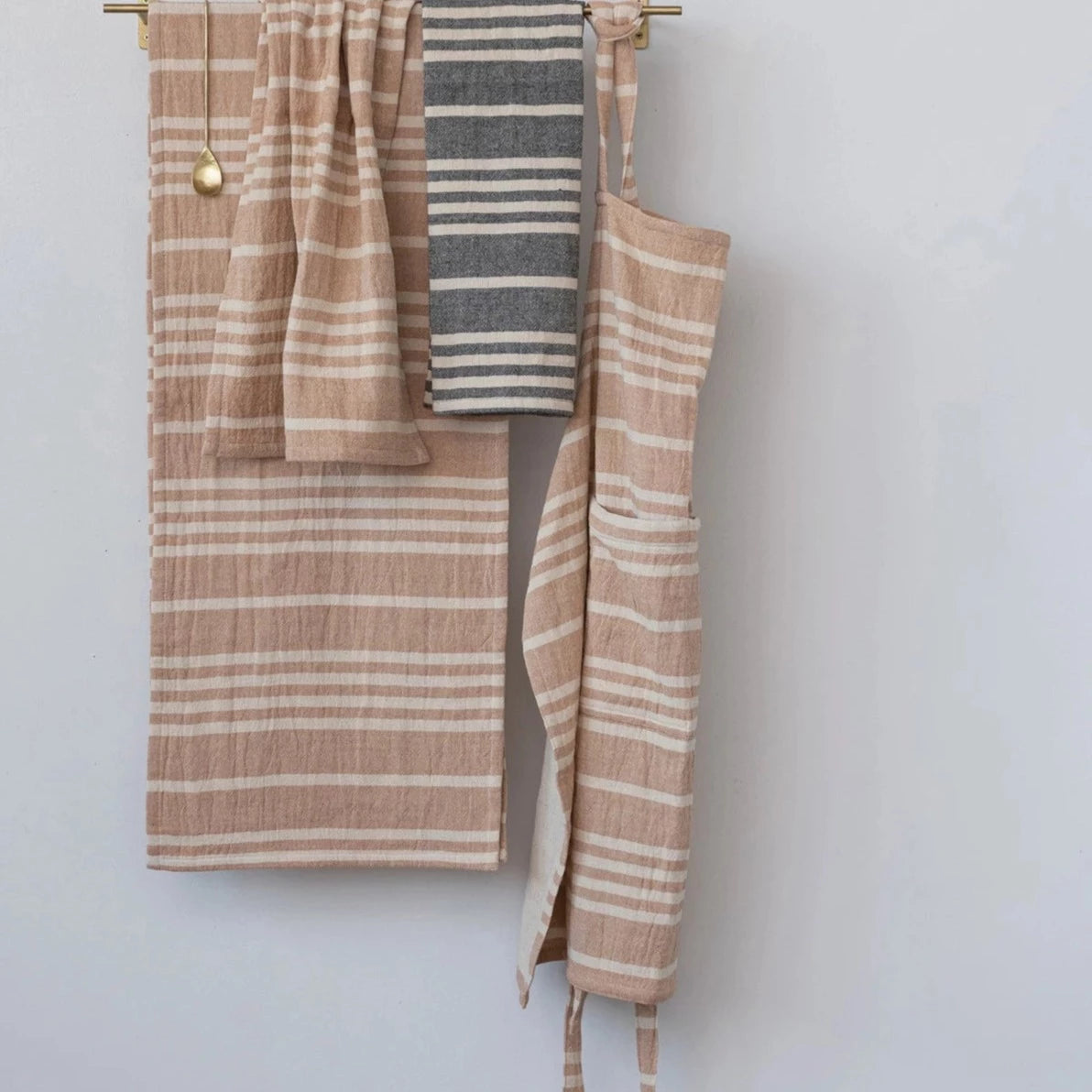 https://www.acottageinthecity.com/cdn/shop/files/Cotton-Double-Cloth-Nude-Striped-Apron-2_1600x.webp?v=1697781898