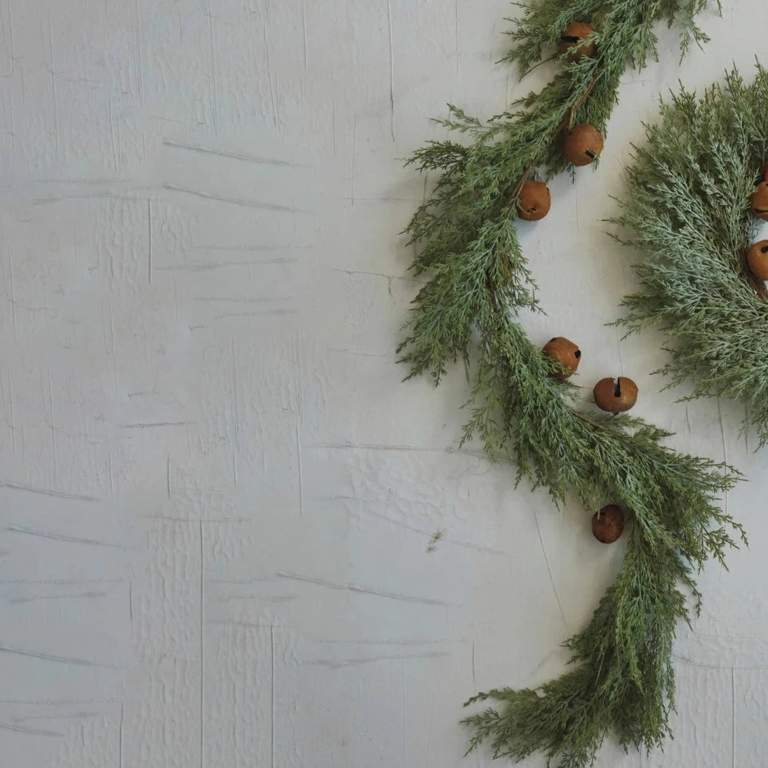 Faux Cedar Garland With Rusty Metal Bells