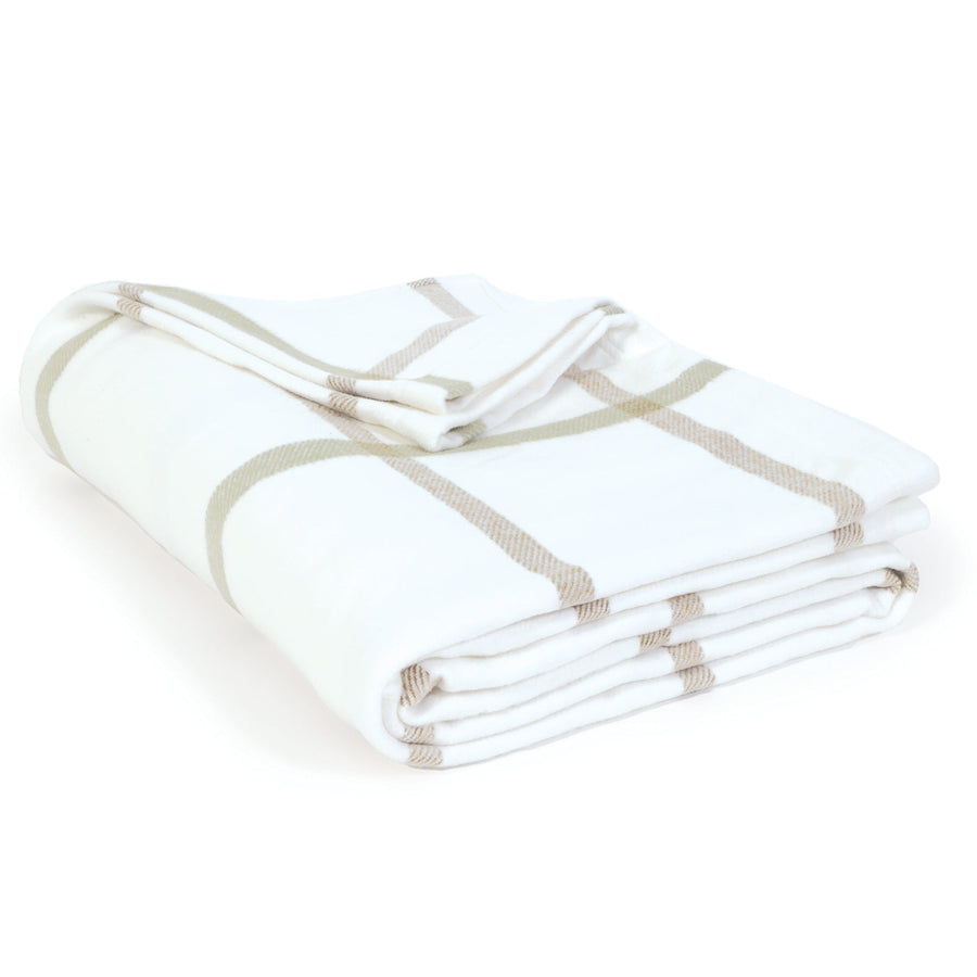 https://www.acottageinthecity.com/cdn/shop/products/Copenhagen_White_Olive_Blanket_by_Pom_Pom_at_Home_0_1200x.jpg?v=1675317837