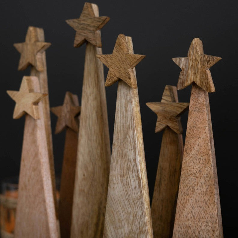 Seven Wooden Christmas Trees On Base